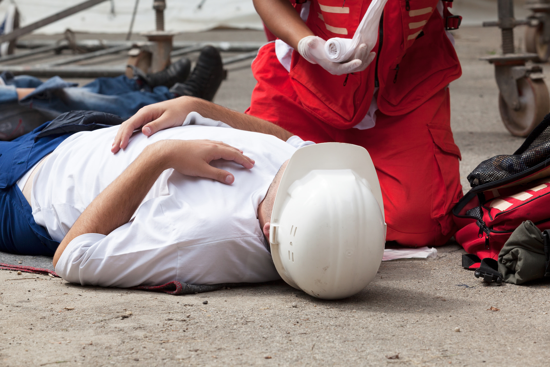 Participants engaged in first aid simulation training exercise